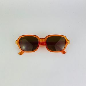 COPY - COPY - Translucent orange frame & brown lens sung…